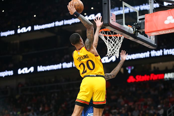 Dec 5, 2021; Atlanta, Georgia, USA; Atlanta Hawks forward John Collins (20) dunks against the Charlotte Hornets in the second half at State Farm Arena.